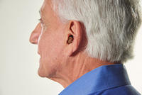 Older Man with Hearing Aids Older Man with Hearing Aids